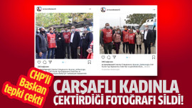 Çarşaflı kadınla çektirdiği fotoğrafı sildi!