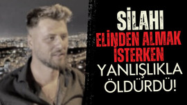 Silahı elinden almak isterken kazara öldürdü